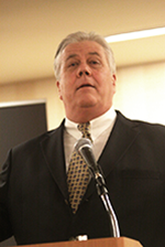 Charles giving a speech